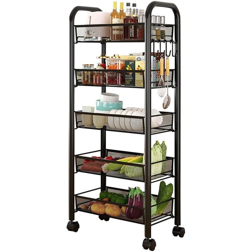 A black metal mesh five-tier rolling utility cart with top shelves holding clear bottles of oil and various spice jars, mid-shelves neatly storing white plates and blue bowls, and bottom shelves overflowing with colorful fresh vegetables like vibrant green peppers, rich purple eggplants, and crisp green cabbage